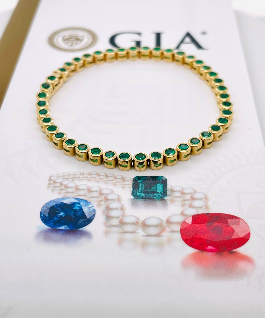 GIA Certified Natural Colombian Emerald 18k Gold Bezel Set Tennis Bracelet