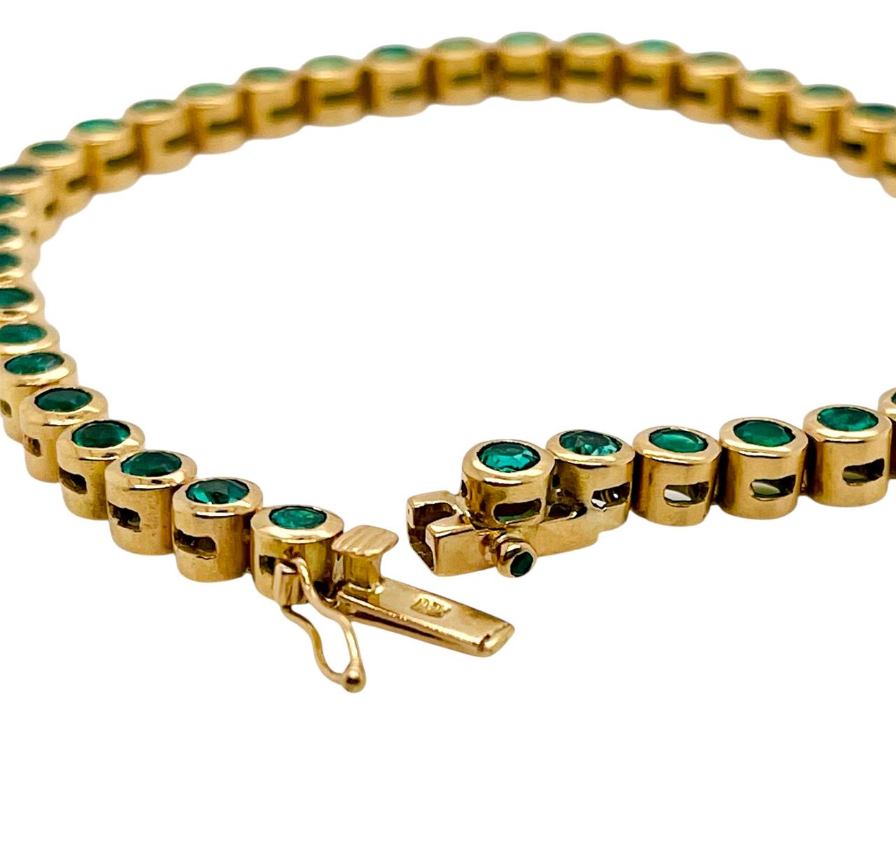 GIA Certified Natural Colombian Emerald 18k Gold Bezel Set Tennis Bracelet
