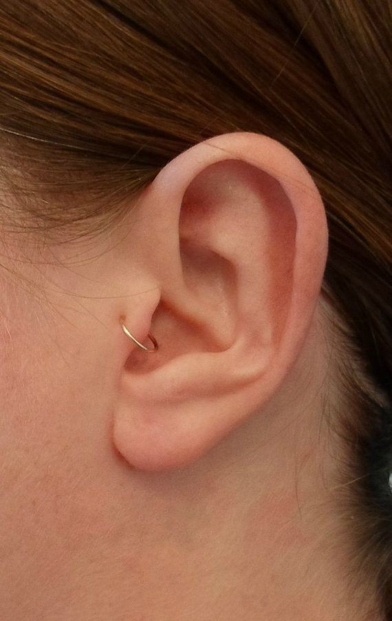 Tragus or earlobe piercing